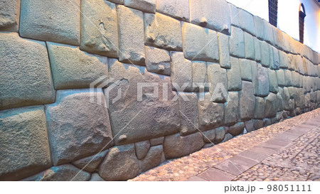 View to Twelve-angled stone aka Hatun Rumiyoc as a part of a wall of the palace of the Archbishop of Cuzco, Peru 98051111