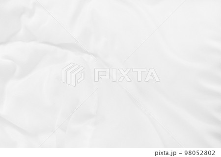 Close up top view of white bedding sheet and wrinkle messy blanket in bedroom after wake up in the morning. Close up top view of white bedding sheet and wrinkle messy blanket in bedroom after wake up in the morning. 98052802