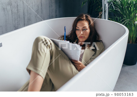 Woman secluded herself in the bathroom to work in silence 98053163
