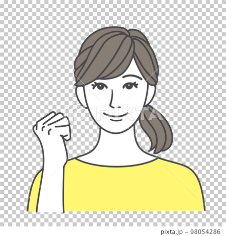 笑顔でガッツポーズをする女性 イエロー 98054286