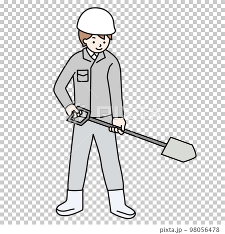 A worker wearing a jumpsuit working with a shovel A worker wearing a jumpsuit working with a shovel 98056478