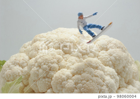 a figures of snowboarder on Whole Cauliflower Vegetable a figures of snowboarder on Whole Cauliflower Vegetable 98060004