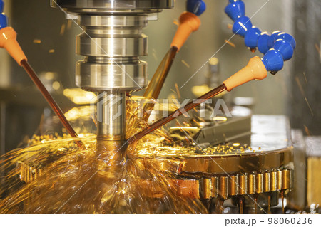 The CNC milling machine cutting the mold parts with oil coolant method. The CNC milling machine cutting the mold parts with oil coolant method. 98060236