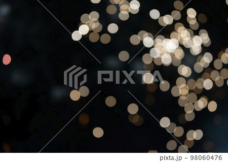 On a black background bokeh from explosions of colorful fireworks. 98060476