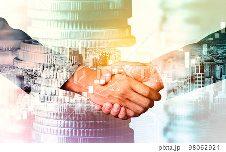 Business handshake on finance prosperity and money technology asset background Business handshake on finance prosperity and money technology asset background 98062924