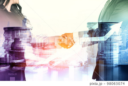 Business handshake on finance prosperity and money technology asset background Business handshake on finance prosperity and money technology asset background 98063074