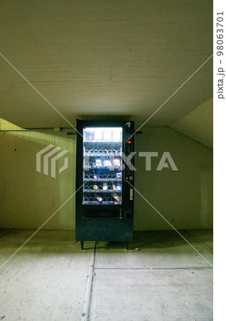 vending machine, with interior light, wall, ceiling and concrete floor vending machine, with interior light, wall, ceiling and concrete floor 98063701