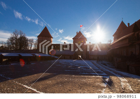 Trakai, Lithuania - 01 08 22: Island Castle in winter in sunny weather 98068911