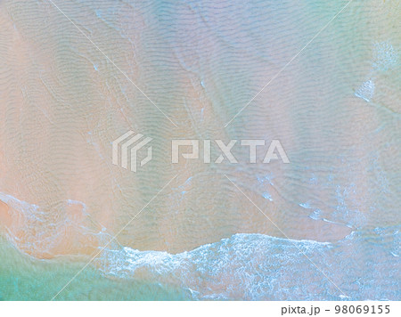 Top view of amazing pastel sand beach and turquoise sea copy space available nature background, High angle view sea sand background 98069155