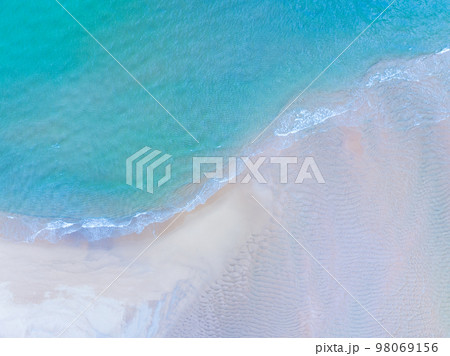 Top view of amazing pastel sand beach and turquoise sea copy space available nature background, High angle view sea sand background Top view of amazing pastel sand beach and turquoise sea copy space available nature background, High angle view sea sand background 98069156