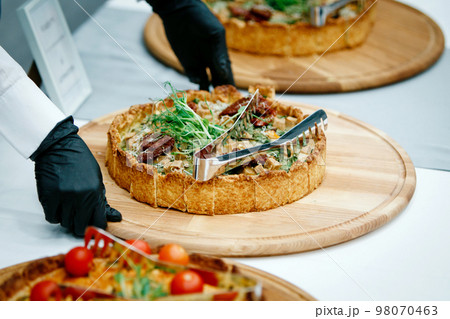 Pies on a table Pies on a table 98070463