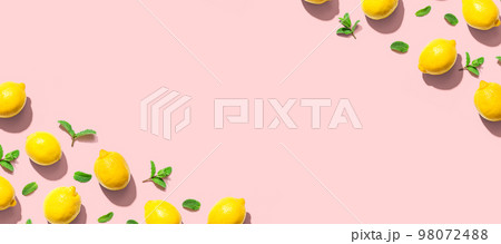 Fresh yellow lemons with mints overhead view 98072488