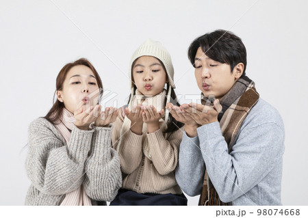 happy Asian Korean family, isolated in white background__in winter fashion, wearing muffler 98074668