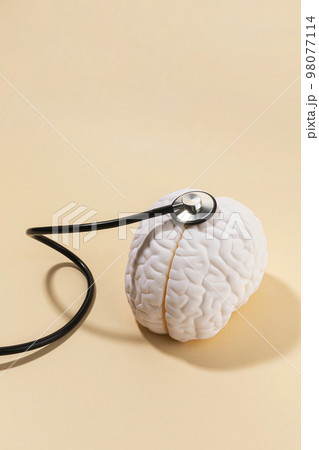 brain health and dementia series_examine a brain miniature 98077114