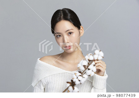 beautiful young Korean Asian woman portrait studio photo in winter skin beauty and cosmetics concept__hair care beautiful young Korean Asian woman portrait studio photo in winter skin beauty and cosmetics concept__hair care 98077439