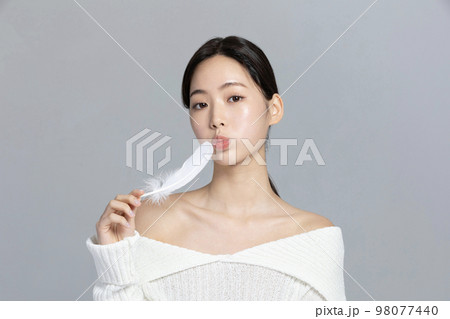 beautiful young Korean Asian woman portrait studio photo in winter skin beauty and cosmetics concept__neck wrinkle care beautiful young Korean Asian woman portrait studio photo in winter skin beauty and cosmetics concept__neck wrinkle care 98077440