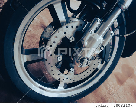 close up. the front wheel of a modern motorcycle. 98082107