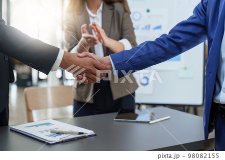 Business shaking hands. Successful businessmen handshaking after good deal. Finishing up meeting concept Business shaking hands. Successful businessmen handshaking after good deal. Finishing up meeting concept 98082155