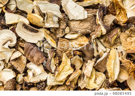 Sliced dried mushrooms. Top view. Sliced dried mushrooms. Top view. 98085495