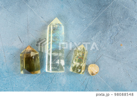Healing crystals on brown background Healing crystals on brown background 98088548