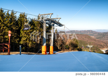 Chairs at ski-lift chair at Salamandra resort in winter season. 98090448
