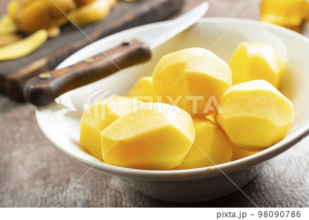 raw potato in bowl 98090786