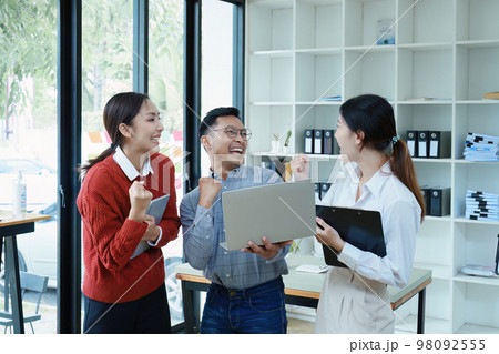 business group people meeting and discuss, plan financial budgets for investments, planning new marketing strategies to fight with competitors. 98092555