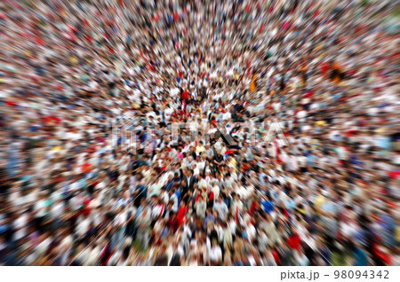 Defocused and blurred crowd of people background 98094342