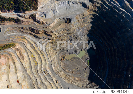 Aerial view of Europe second largest open pit copper mine, Rosia Poieni, Romania 98094842