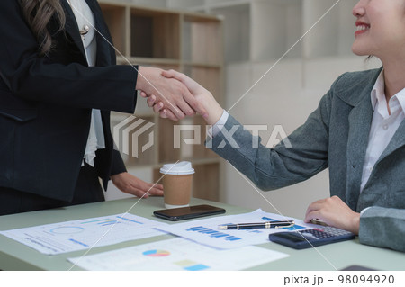Business people handshake with business partners. Successful business concept. shaking hand after deal concept 98094920