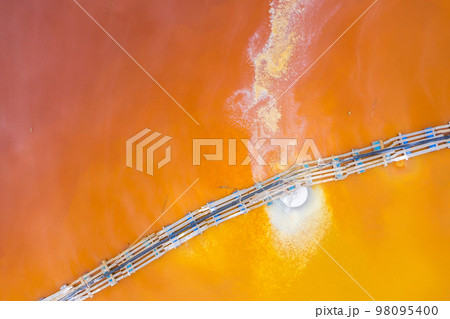 Aerial image of red polluted mining water residuals Aerial image of red polluted mining water residuals 98095400