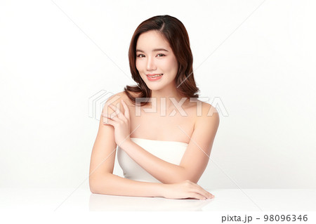 Beautiful young asian woman with clean fresh skin on white background, Face care, Facial treatment, Cosmetology, beauty and spa, Asian women portrait. Beautiful young asian woman with clean fresh skin on white background, Face care, Facial treatment, Cosmetology, beauty and spa, Asian women portrait. 98096346