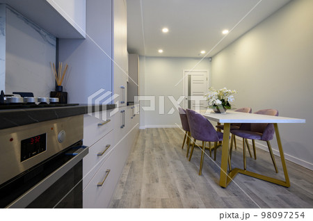 Large beige and cream luxury kitchen interior Large beige and cream luxury kitchen interior 98097254