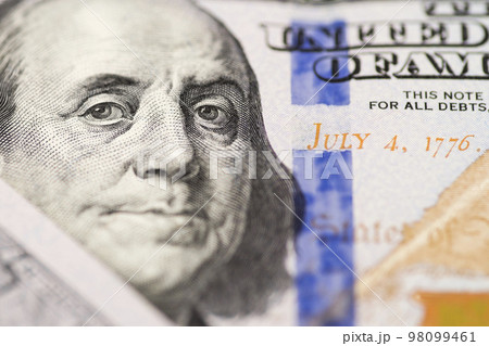 The face of Benjamin Franklin on the hundred dollar banknote, backgrounds 98099461