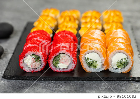 Premium Photo  Sushi set philadelphia roll california unagi black