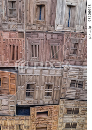 Old wooden windows hidden in traditional texture and background. 98106668