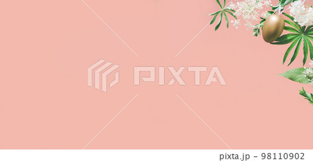 Golden Easter eggs in assorted floral and jungle tree green leaves and white flowers corner border on peach pink. Natural sustainable environment friendly cosmetics mockup flat lay banner Golden Easter eggs in assorted floral and jungle tree green leaves and white flowers corner border on peach pink. Natural sustainable environment friendly cosmetics mockup flat lay banner 98110902