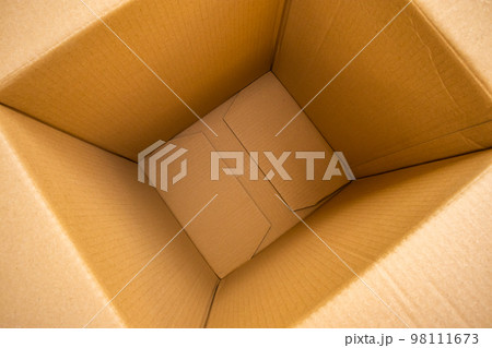 Empty cardboard box for storage. A closed brown box, isolated on a white  background. view from the side Stock Photo by ©Kirillzumix@yandex.ru  443480678