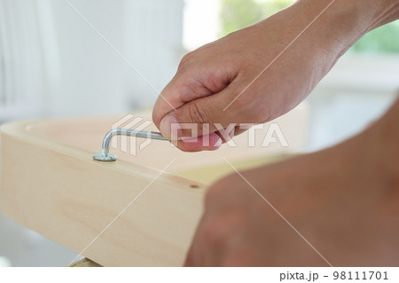 Assembly wooden furniture at home using screw allen 98111701