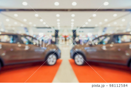 new cars in showroom interior blurred abstract background new cars in showroom interior blurred abstract background 98112584