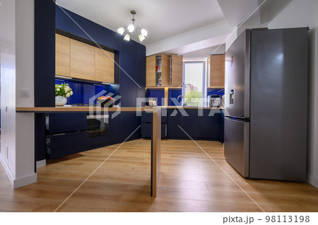 Luxury large blue and wood colored kitchen Luxury large blue and wood colored kitchen 98113198