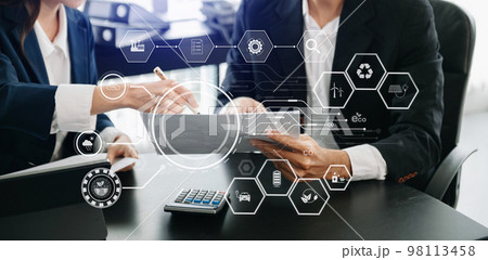 Business asian team working virtual modern smartphone to reduce CO2 emissions carbon footprint climate change to limit global warming.Sustainable development and green business concept Business asian team working virtual modern smartphone to reduce CO2 emissions carbon footprint climate change to limit global warming.Sustainable development and green business concept 98113458