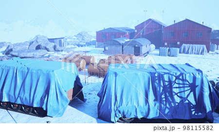 Polar weather station on the shore of the sea 98115582