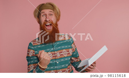 Happy hippie man open envelope letter, career growth advance promotion bank loan approve, great news Happy hippie man open envelope letter, career growth advance promotion bank loan approve, great news 98115618