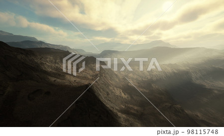 Alpine chains shrouded in the morning fog 98115748