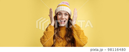 Close-up amused surprised pretty young european woman open eyes smiling broadly reacting astonished happy receiving incredible awesome surprise grinning joyfully celebrating birthday 98116480