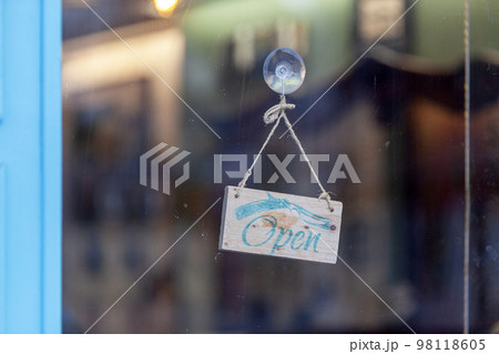 Open sign of a barber shop Open sign of a barber shop 98118605