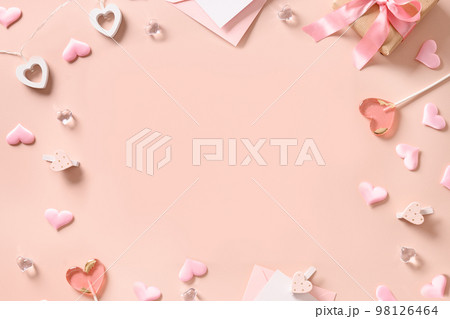 Valentine's day card with envelope and pink lollipops as heart. 98126464
