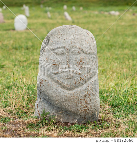 Historical stone sculptures near Old Burana tower that depict various figures and scenes from Kyrgyz history and culture. These sculptures provide insight into country's rich history and traditions Historical stone sculptures near Old Burana tower that depict various figures and scenes from Kyrgyz history and culture. These sculptures provide insight into country's rich history and traditions 98132660