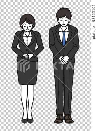 お辞儀をするスーツを着た男性と女性 98135102